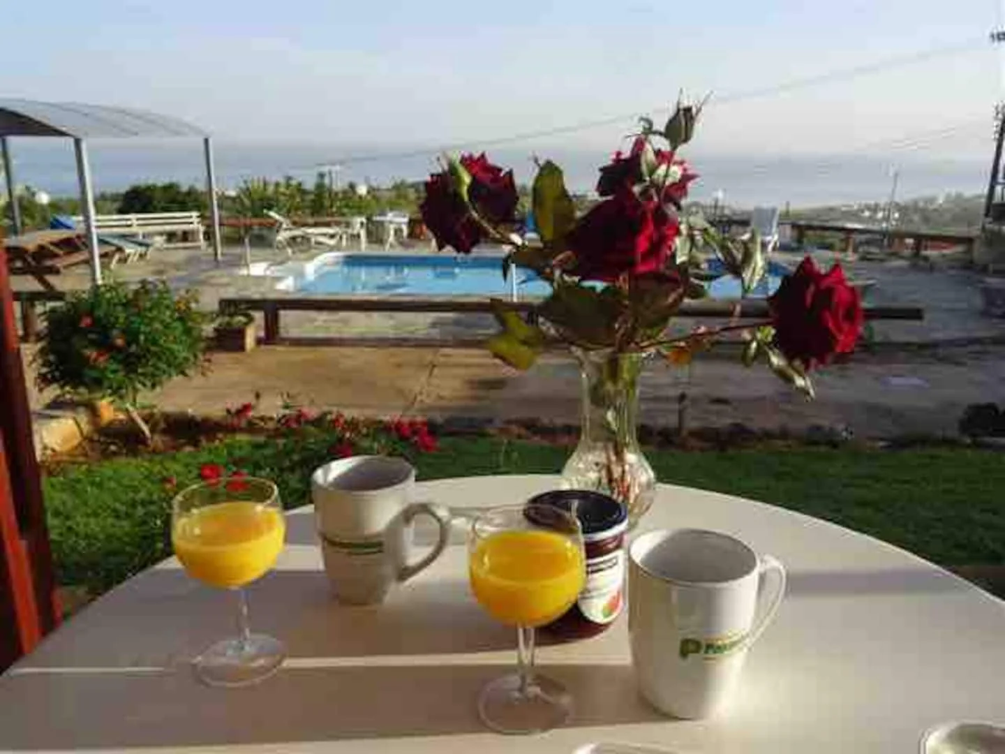 A table overlooking the shared pool and bay